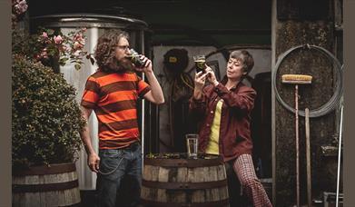 couple drinking at west kerry brewery